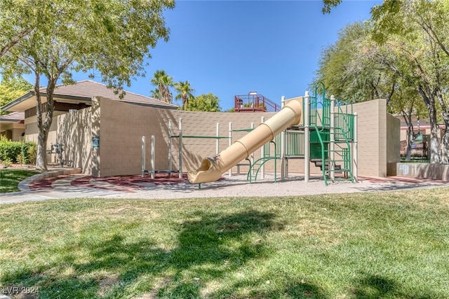 view of playground with a yard