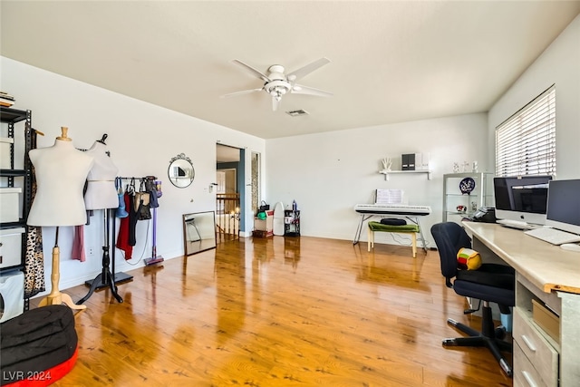 office space featuring ceiling fan and wood-type flooring