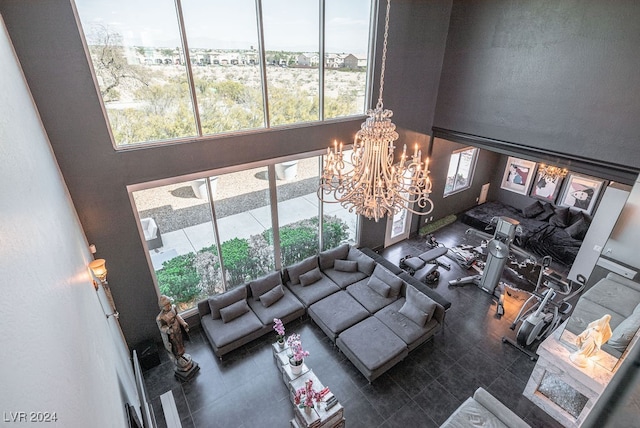 living room with a chandelier and plenty of natural light