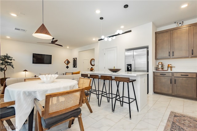 dining room with ceiling fan