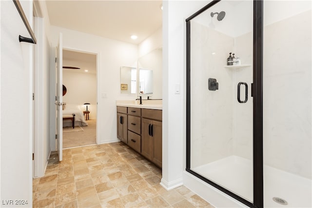 bathroom with vanity and an enclosed shower