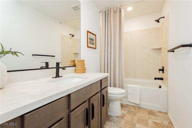 full bathroom with vanity, toilet, and shower / tub combo with curtain