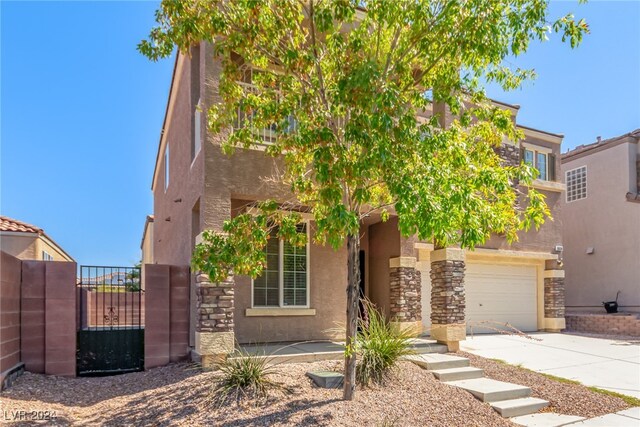 view of front of home with a garage