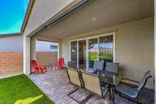 view of patio / terrace with fence