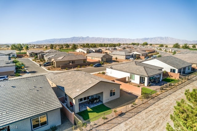 birds eye view of property with a residential view and a mountain view