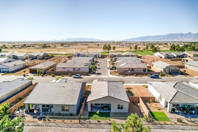 aerial view featuring a mountain view and a residential view