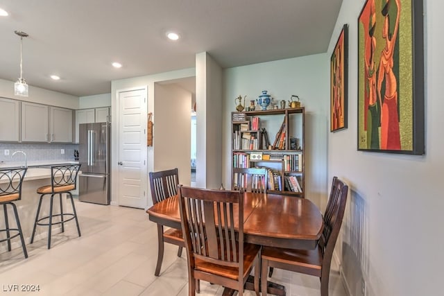 dining area featuring recessed lighting