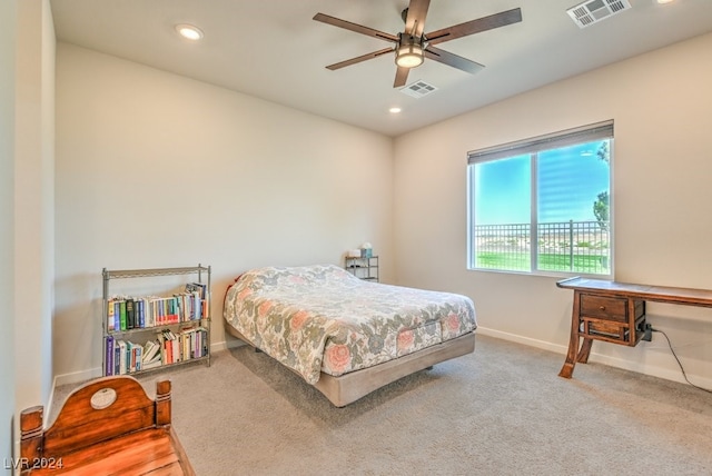 bedroom with carpet floors, recessed lighting, visible vents, and baseboards