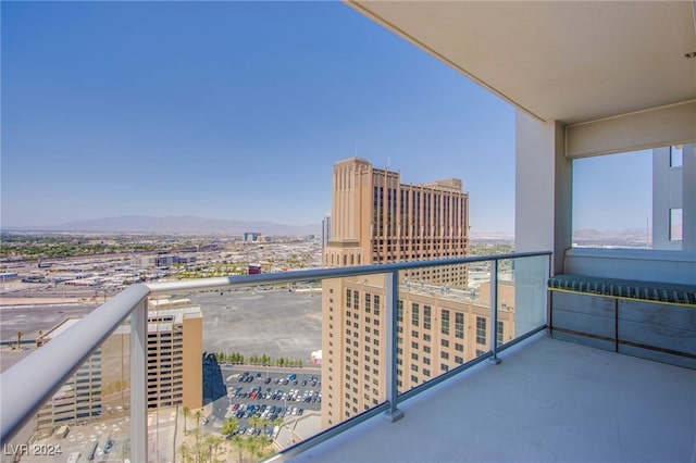 balcony featuring a mountain view