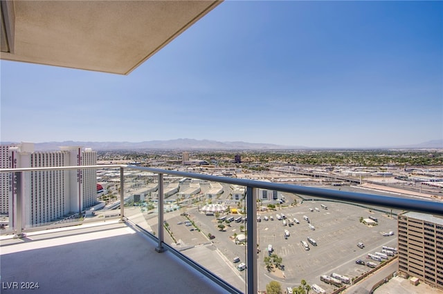 balcony featuring a mountain view