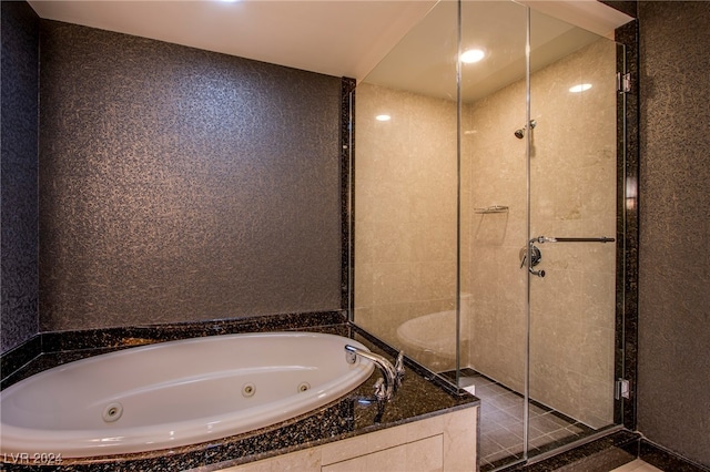 bathroom featuring separate shower and tub and tile patterned floors