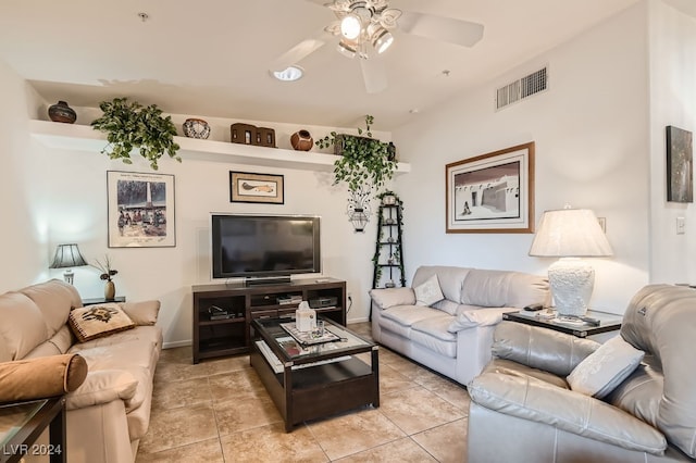 tiled living room featuring ceiling fan