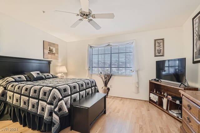 bedroom featuring light wood-type flooring and ceiling fan