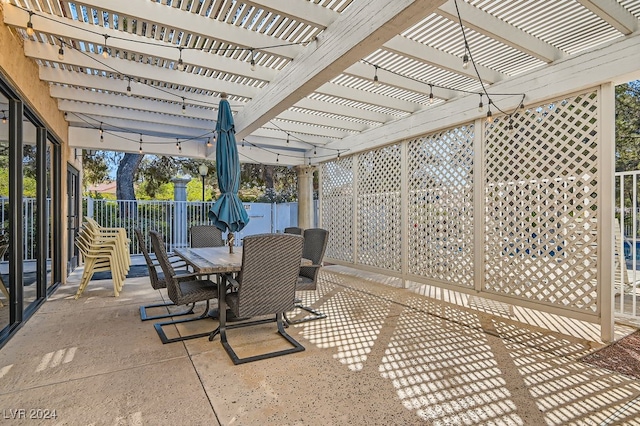 view of patio featuring a pergola