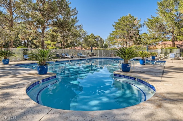 view of pool featuring a patio area