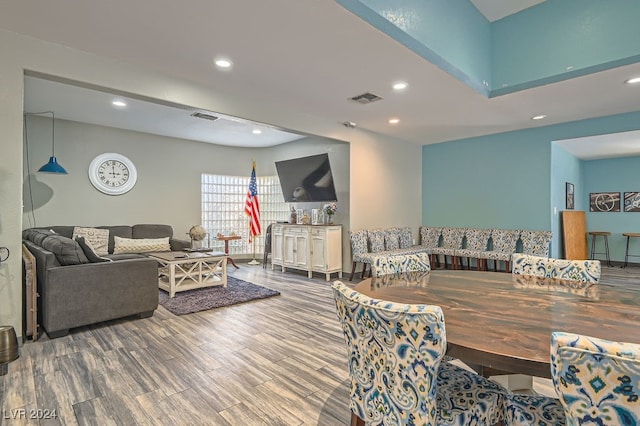 dining area featuring hardwood / wood-style floors