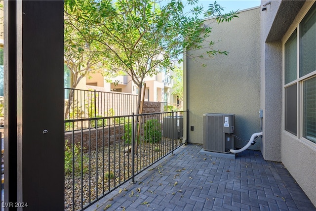 view of patio with central AC unit