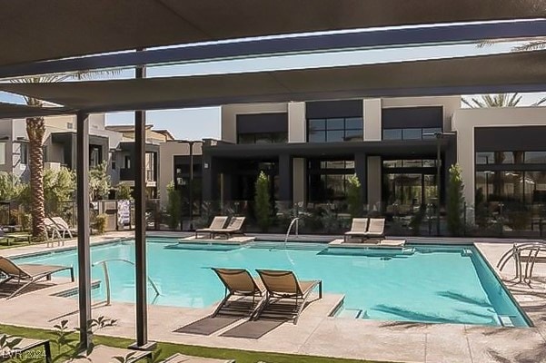 view of swimming pool featuring a patio