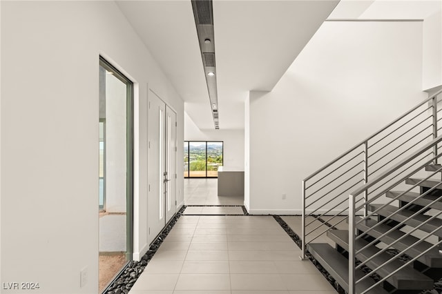 interior space with light tile patterned flooring