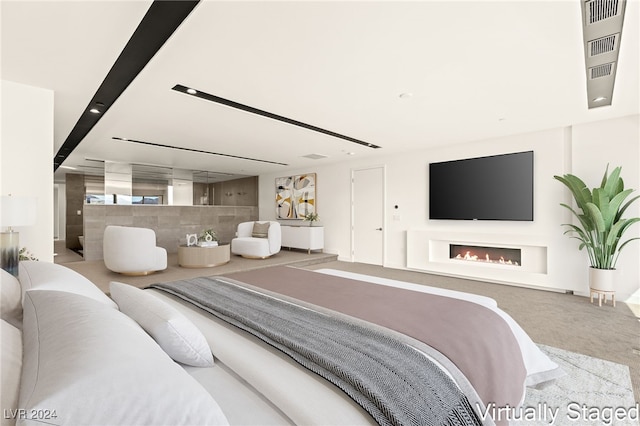 carpeted bedroom featuring tile walls