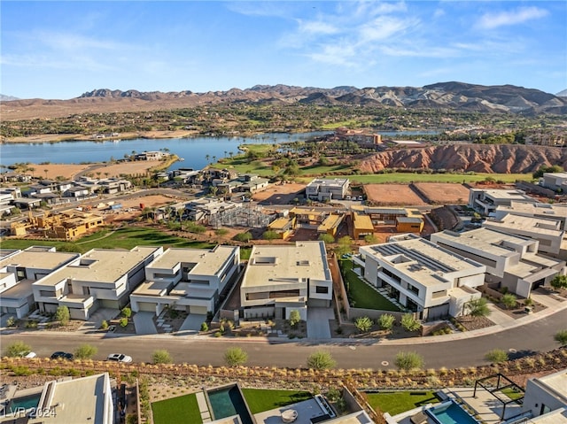 bird's eye view featuring a water and mountain view