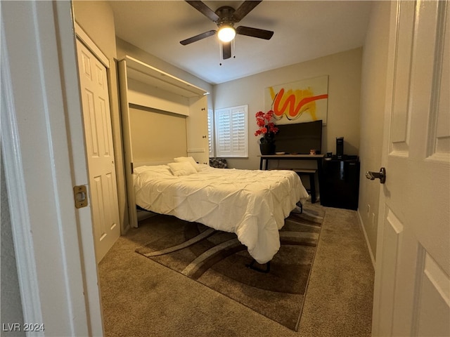 bedroom featuring light carpet and ceiling fan