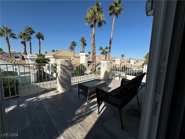 view of patio / terrace with a balcony