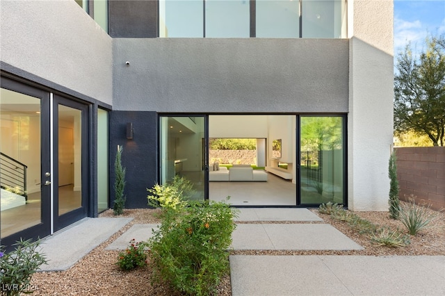 doorway to property featuring a patio