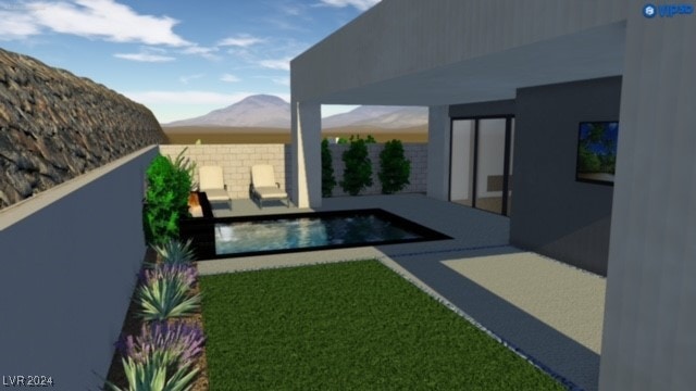 view of swimming pool featuring a mountain view and a patio area