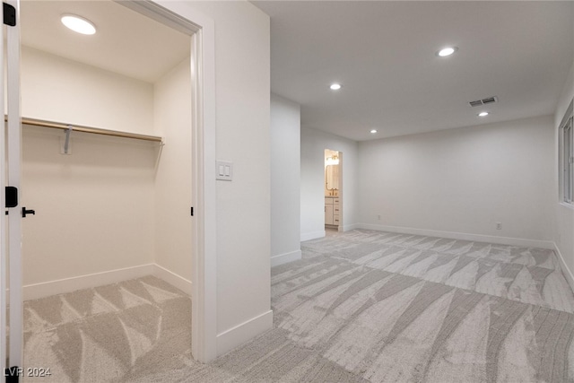 basement with light carpet