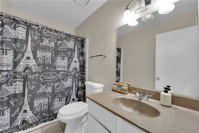 bathroom featuring tile patterned flooring, vanity, toilet, and a shower with curtain