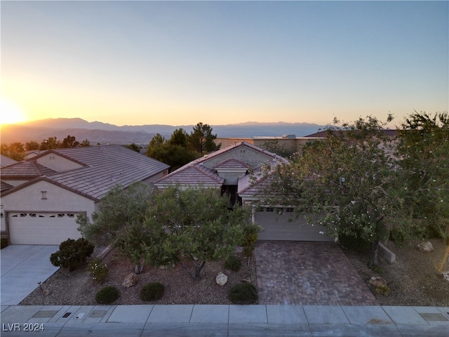 aerial view at dusk with a mountain view