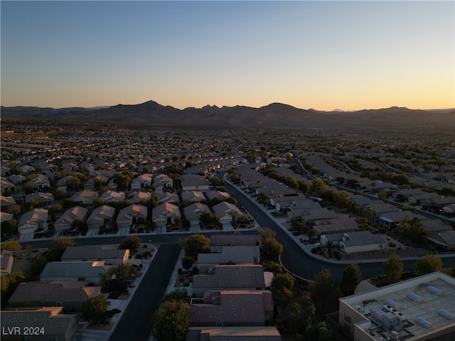 aerial view at dusk with a mountain view