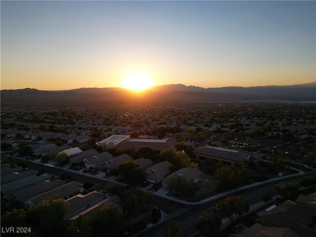 aerial view at dusk with a mountain view