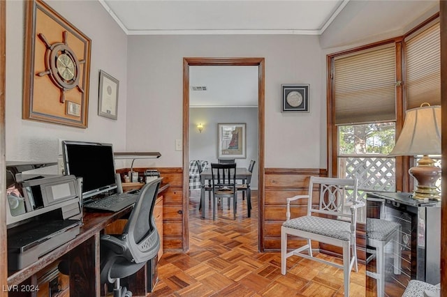 office space with light parquet floors, wooden walls, and crown molding