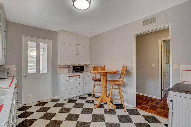 kitchen with white cabinetry