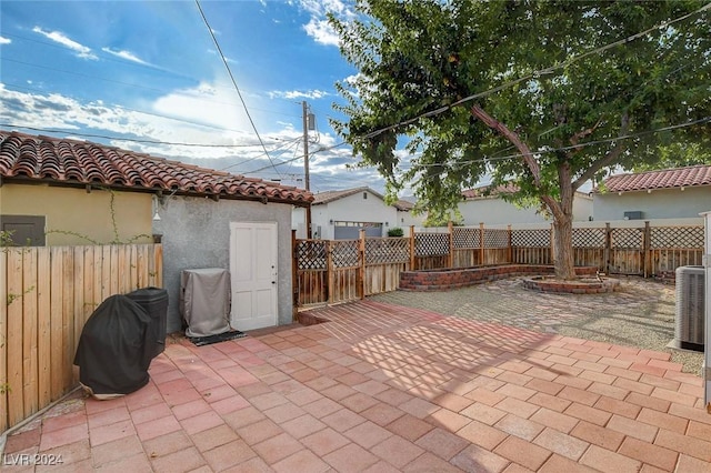 view of patio / terrace with central AC unit