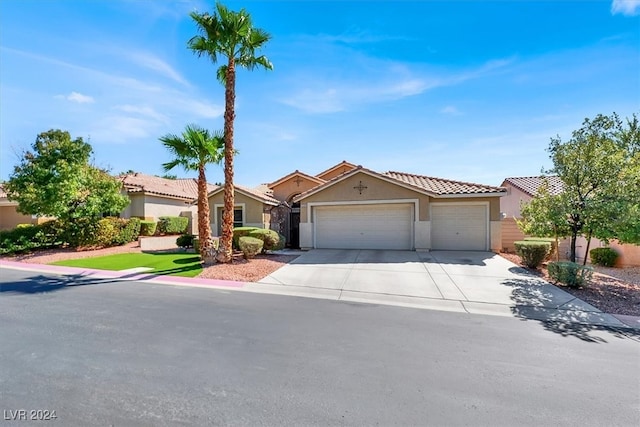 view of front of home with a garage