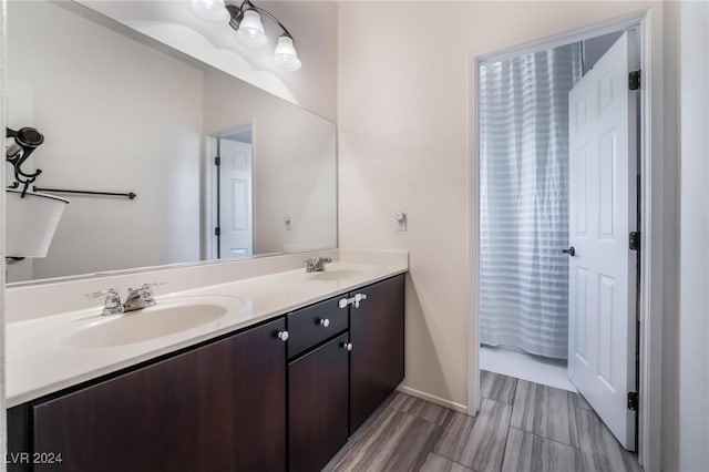 bathroom with vanity and walk in shower