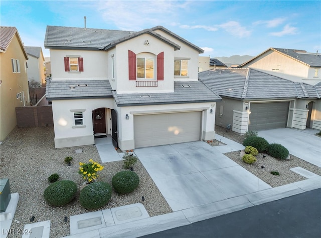 view of front of property with a garage