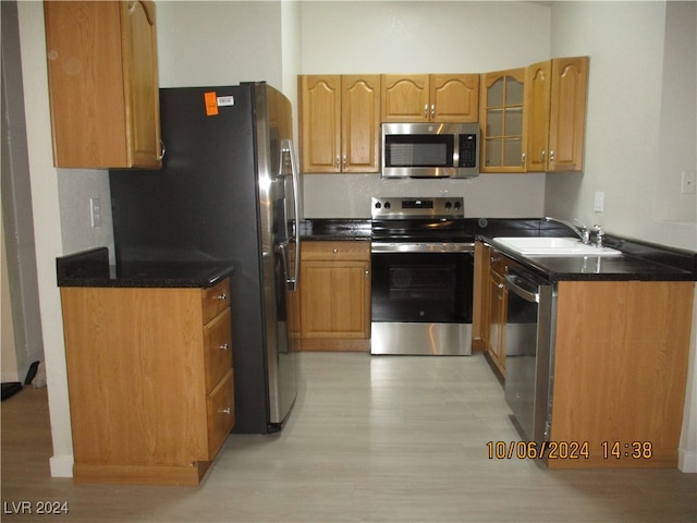 kitchen featuring appliances with stainless steel finishes and sink