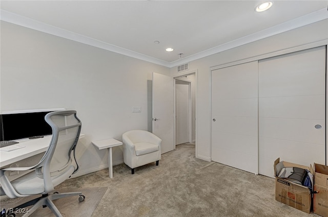 carpeted home office featuring crown molding