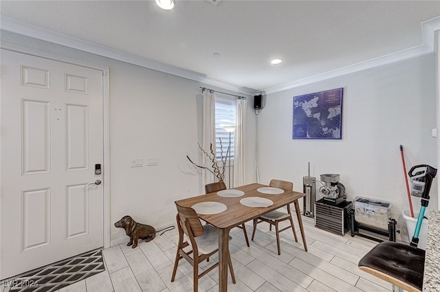 dining room with crown molding