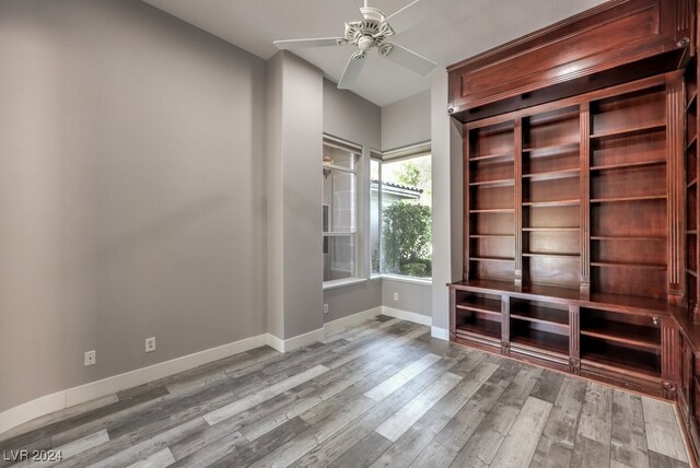 interior space featuring light wood-type flooring and ceiling fan