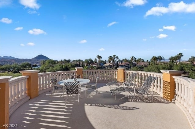 view of patio / terrace with a mountain view