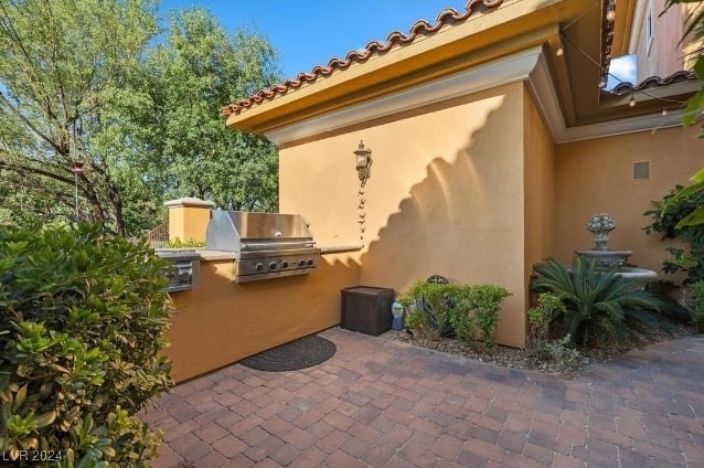 view of patio featuring grilling area and area for grilling