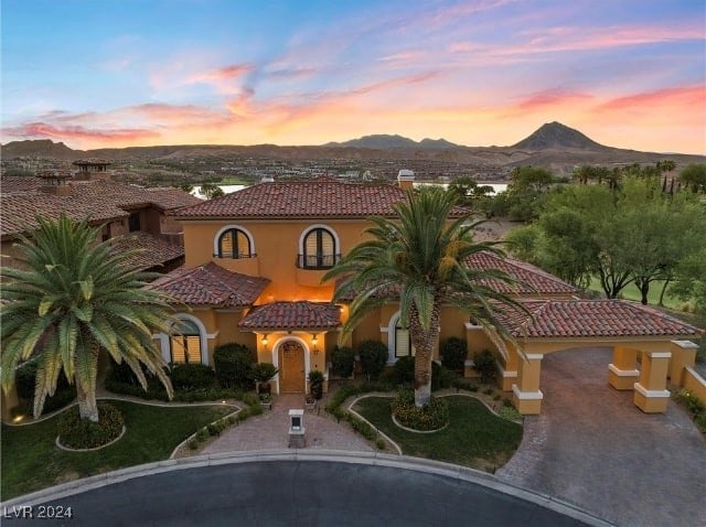 view of front of property with a mountain view