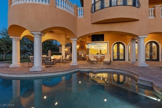 view of pool featuring a patio area