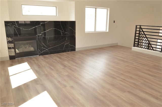 living room with light hardwood / wood-style flooring