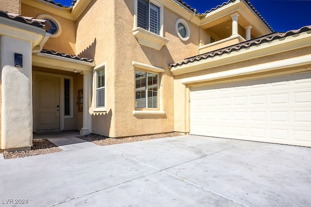 exterior space featuring a garage